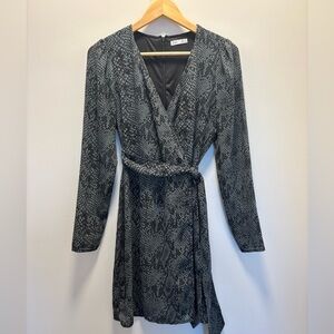 Dex wrap, dress snake print sheer exterior with black interior lining